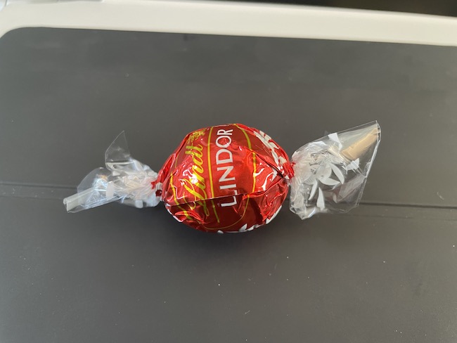 a candy wrapped in a red wrapper