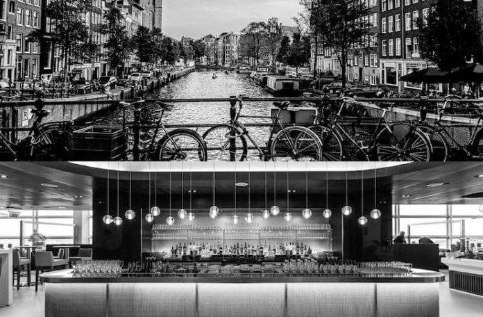 a bar with a bar and a river in the background