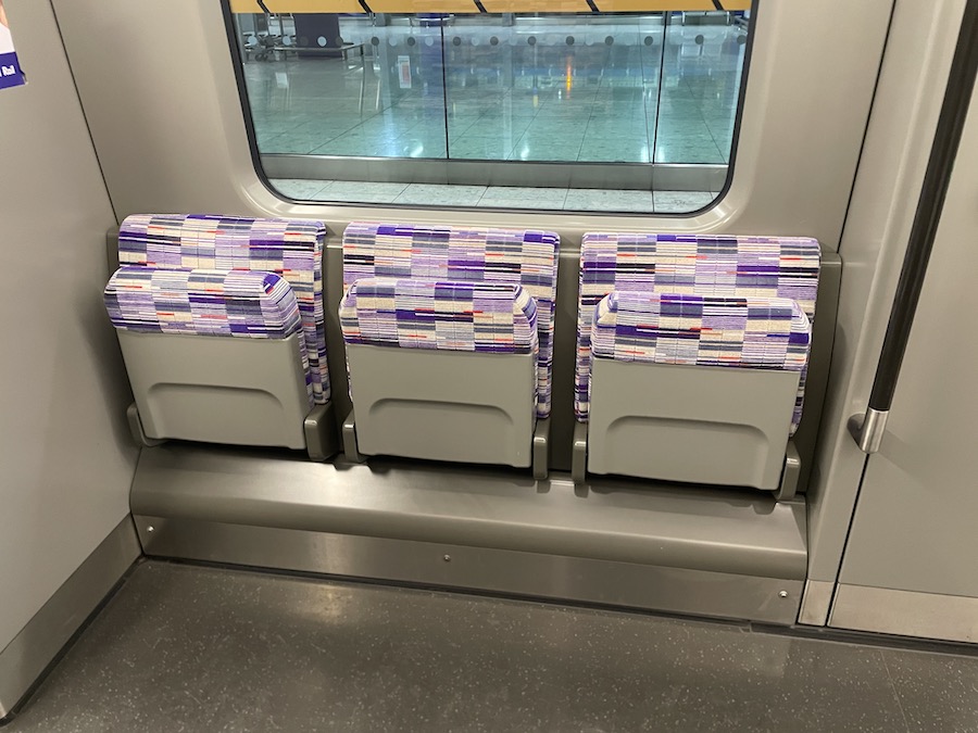 a row of seats in a train