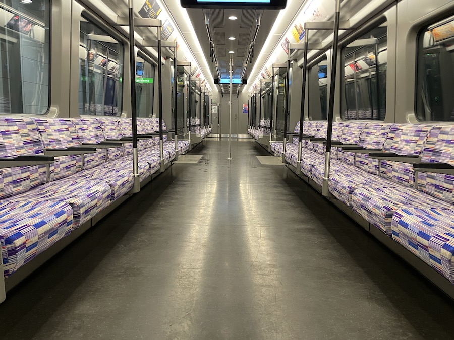 a subway train with seats