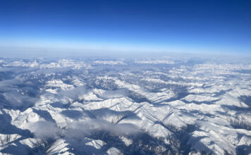 a aerial view of snowy mountains