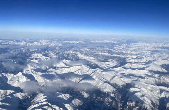 a aerial view of snowy mountains