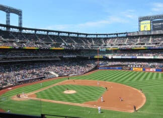 a baseball stadium with people watching
