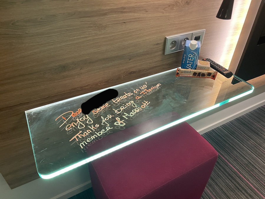 a glass table with writing on it