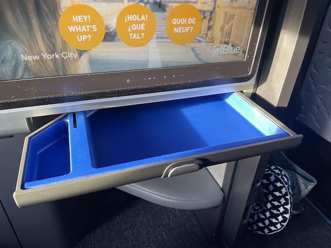 a blue tray on a bus
