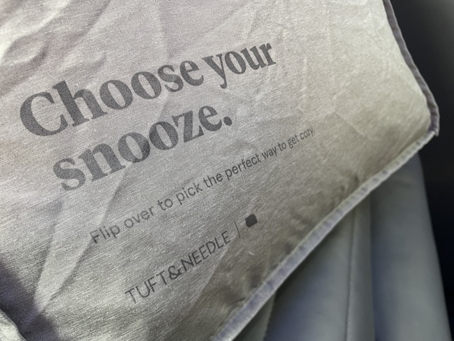 a pillow with text on it