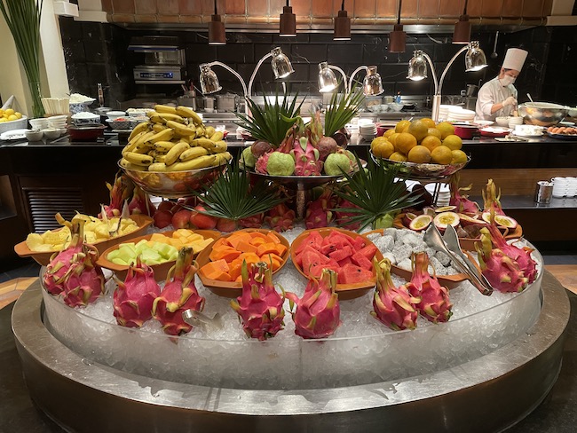 a table full of fruit and vegetables