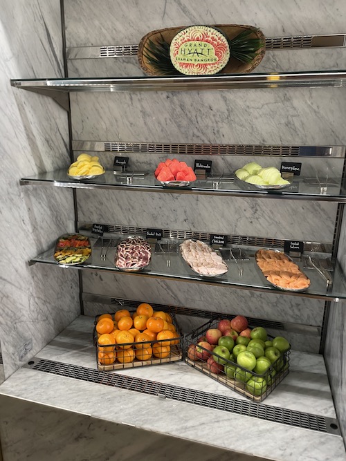 a shelf with fruit on it