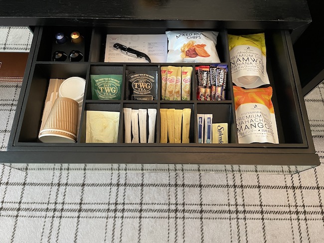 a drawer with a variety of food items