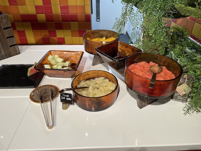 a group of bowls of food on a table