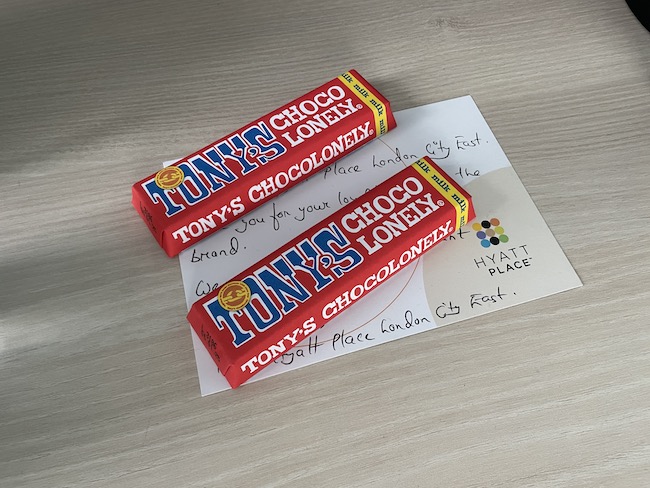 a couple of red and blue candy bars on a white paper