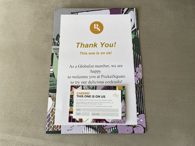 a thank you card on a clipboard