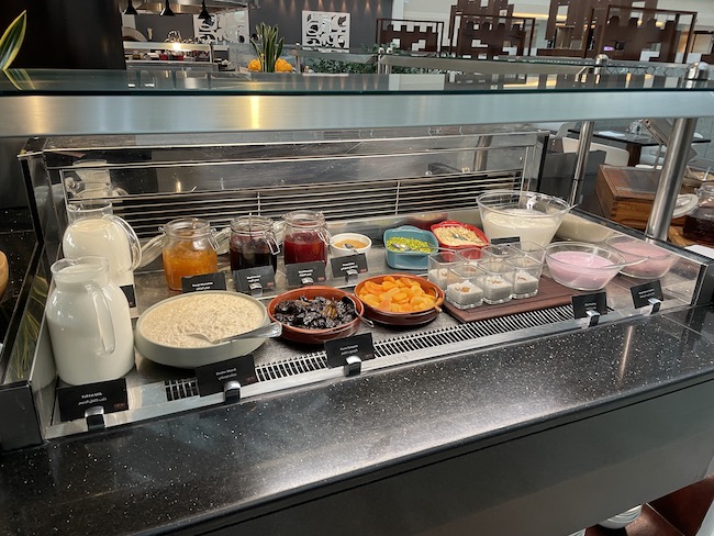 a buffet with different foods on it