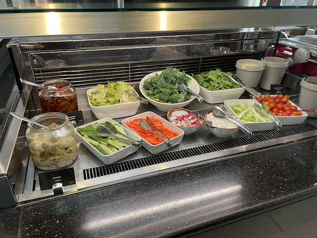 a salad bar with different types of food