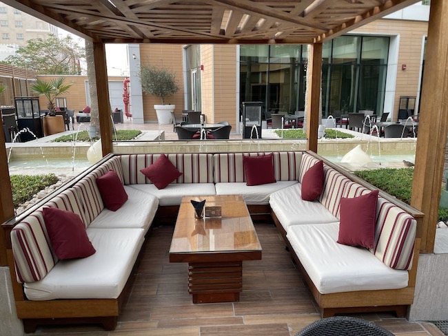 a couches and a table on a patio