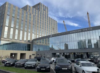 a building with cars parked in front of it
