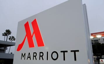 a sign with a red logo
