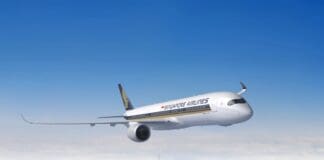 a white airplane in the air