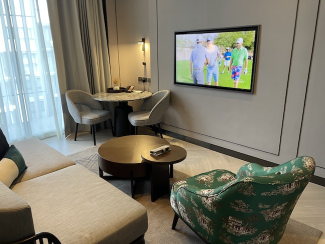 a room with a television and a table