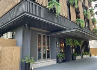a building with plants on the front