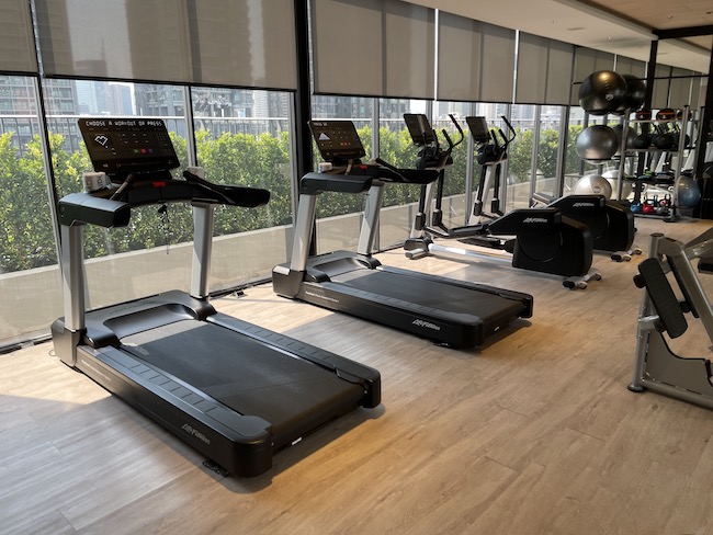 a group of treadmills in a room