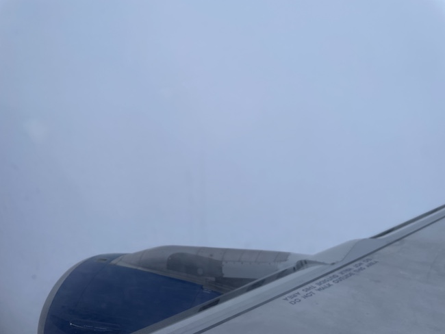 a plane's wing in the snow