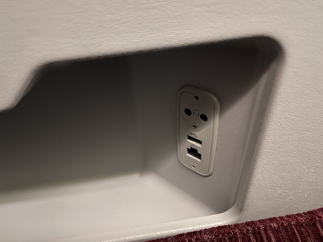 a white wall with a couple of usb ports