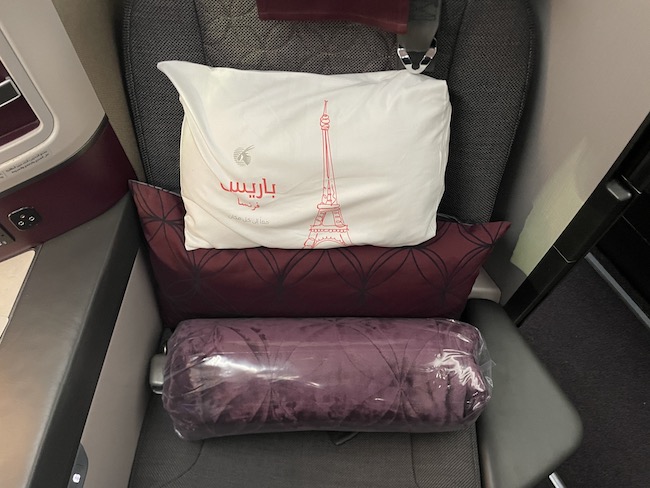 a pillow and pillow on a seat