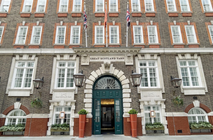 a building with flags on the front