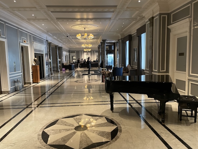 a piano in a lobby