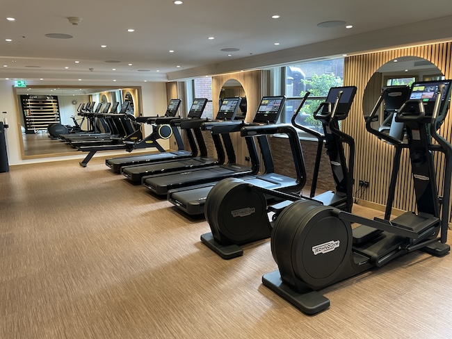 a room with treadmills and exercise machines