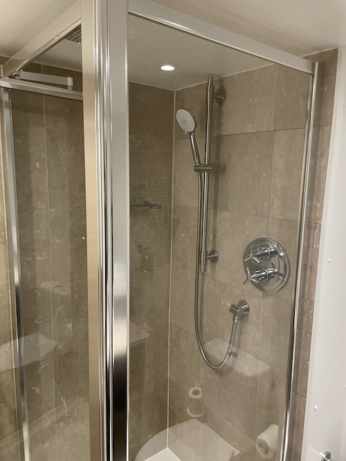 a shower with a glass door