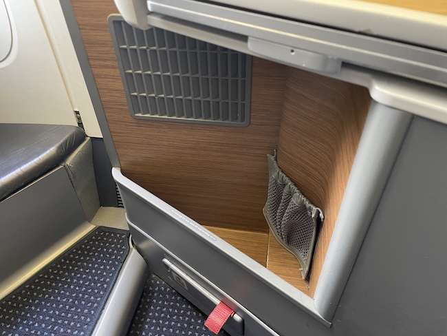 a small storage area in a plane