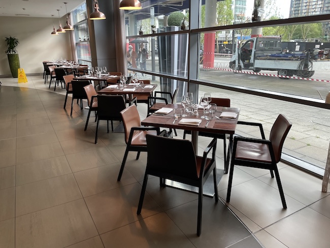 a restaurant with tables and chairs