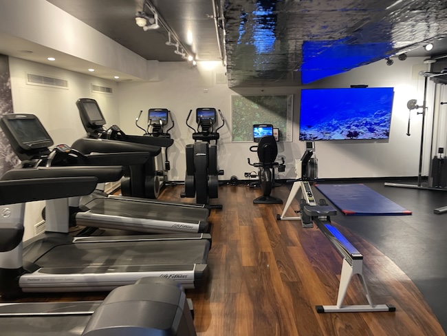 a room with treadmills and treadmills