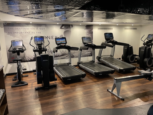 a group of treadmills in a room