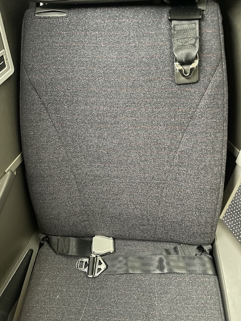 a seat belt in a plane