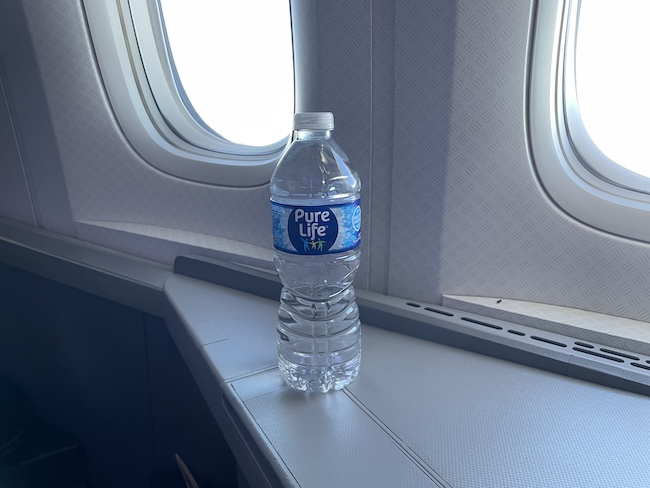 a water bottle on a window sill