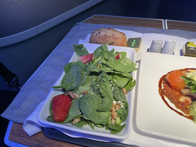 a plate of food on a tray