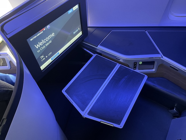 a screen and a monitor in a plane