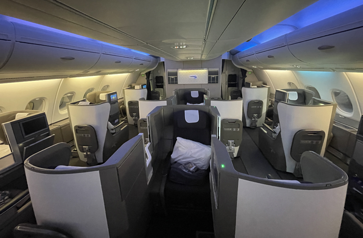 an airplane with seats and a blue light