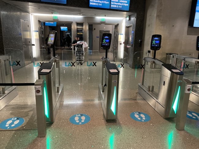 a group of electronic turnstiles in a building