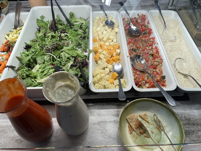 a trays of food in a buffet