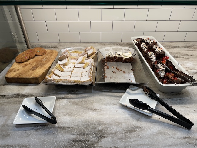 a table with different types of desserts