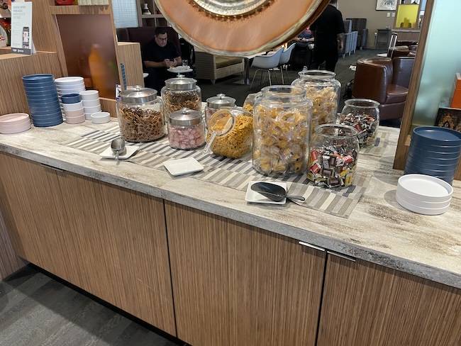 a buffet with food in jars