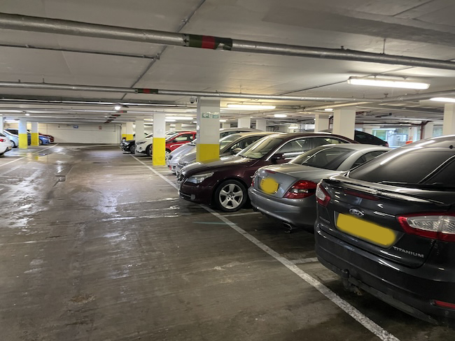 a parking garage with cars