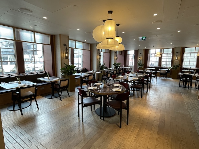 a restaurant with tables and chairs