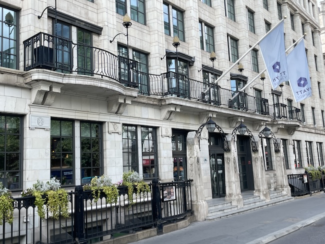 a building with a flag on the front