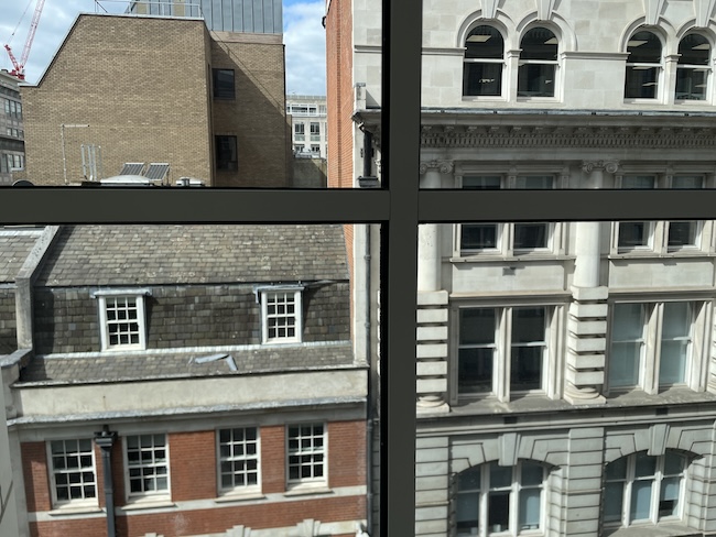 a view of buildings from a window