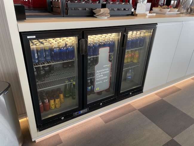 a refrigerator with drinks in it